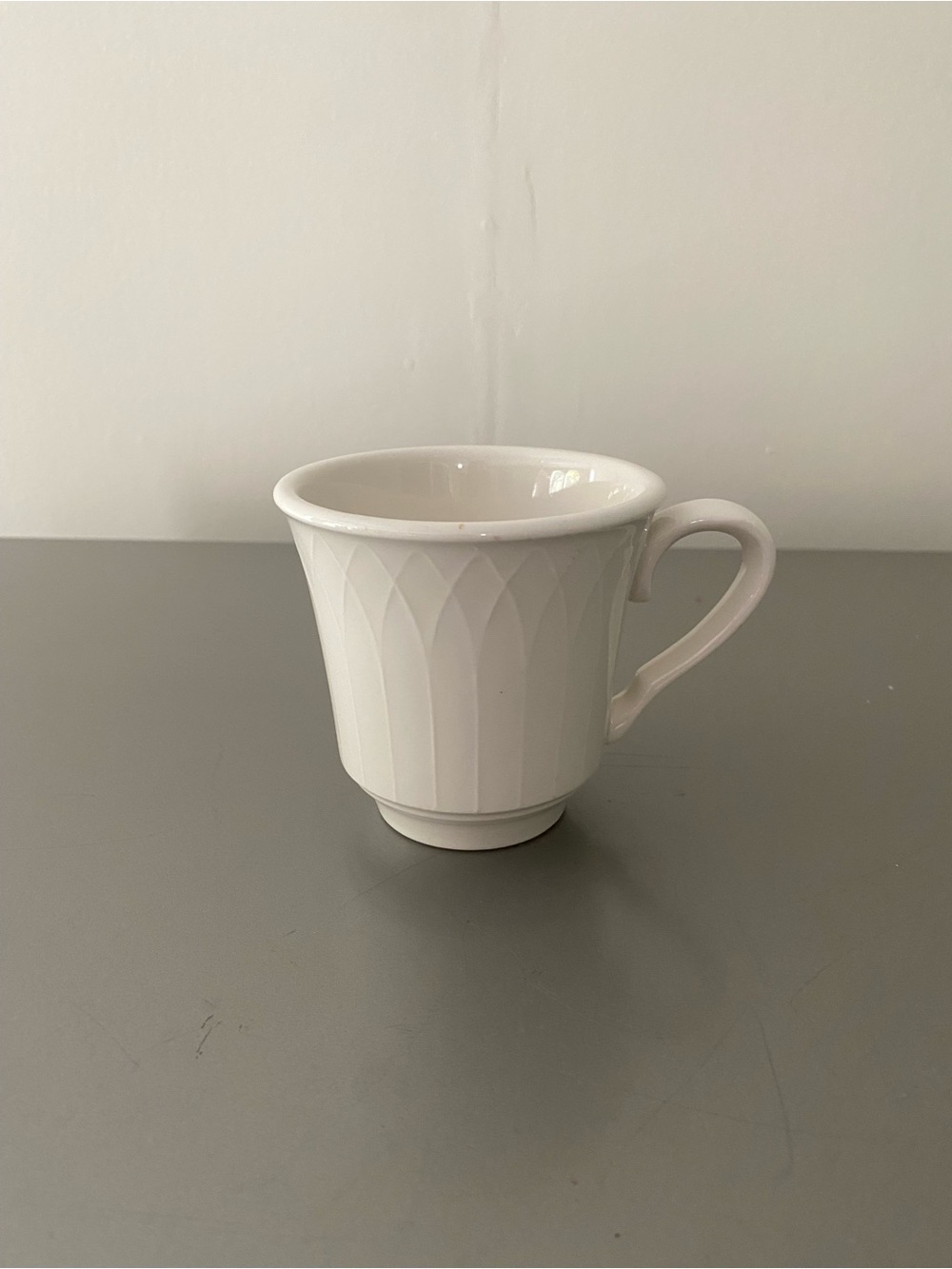 Classic White Ceramic Tea Cup with Fluted Detail